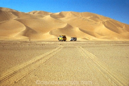 ripple;ripples;shadow;shadows;dune;dunes;deserts;deserted;desolate;desolation;sand_dune;sand_dunes;sand;nature;natural;dry;hot;texture;thirst;silence;vast;vastness;endless;arid;waterless;parched;infertile;barren;global-warming;wilderness;ecosystem;ecosystems;immense;natural-wonder-of-the-world;land-rover;truck;landrover;4x4;track;tracks;wheel-tracks;tire;tyre;overland
