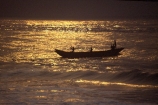 Fisherman;african;fishermen;fishing;silhouette;sunset;sunrise;ocean;sea;atlantic;elmina;ghana;ghanain;west-africa;sahel;light;boat;boats;fishing-boat;fishing-boats;dawn