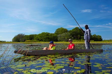 Africa;African;aquatic-plant;aquatic-plants;boat;boats;Botswana;boy;boys;canoe;canoes;delta;deltas;dugout;dugout-canoe;dugout-canoes;dugouts;Endorheic-basin;female;inland-delta;internal-drainage-systems;lily-pad;lily-pads;logboat;makoro;makoros;mekoro;mekoros;mokoro;mokoro-safari;mokoros;monoxylon;Nymphaeaceae;Okavango;Okavango-Delta;Okavango-Swamp;people;person;pirogue;pirogues;plant;plants;poler;polers;river-delta;Seven-Natural-Wonders-of-Africa;Southern-Africa;tourism;tourist;tourists;water-lilies;water-lily;water-lily-pad;water-lily-pads;water_lilies;water_lily;waterlilies;waterlily;waterlily-pad;waterlily-pads;woman;women