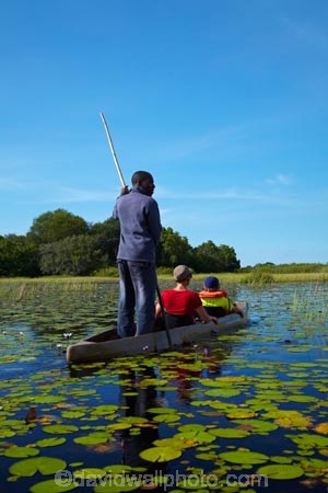 Africa;African;aquatic-plant;aquatic-plants;boat;boats;Botswana;boy;boys;canoe;canoes;delta;deltas;dugout;dugout-canoe;dugout-canoes;dugouts;Endorheic-basin;female;inland-delta;internal-drainage-systems;lily-pad;lily-pads;logboat;makoro;makoros;mekoro;mekoros;mokoro;mokoro-safari;mokoros;monoxylon;Nymphaeaceae;Okavango;Okavango-Delta;Okavango-Swamp;people;person;pirogue;pirogues;plant;plants;poler;polers;river-delta;Seven-Natural-Wonders-of-Africa;Southern-Africa;tourism;tourist;tourists;water-lilies;water-lily;water-lily-pad;water-lily-pads;water_lilies;water_lily;waterlilies;waterlily;waterlily-pad;waterlily-pads;woman;women