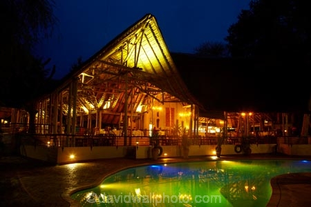 accommodation;Africa;bar;bars;Botswana;cafe;cafes;Chobe-Safari-Lodge;diner;diners;dining;dusk;evening;flood-lighting;flood-lights;flood-lit;flood_lighting;flood_lights;flood_lit;floodlighting;floodlights;floodlit;green;holiday;holiday-accommodation;holidays;hotel;hotels;Kasane;light;lights;lodge;lodges;night;night_time;nightfall;pool;pools;resort;resorts;restaurant;restaurants;Southern-Africa;swimming-pool;swimming-pools;twilight;vacation;vacations