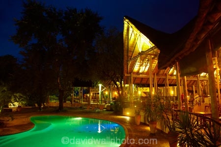 accommodation;Africa;bar;bars;Botswana;cafe;cafes;Chobe-Safari-Lodge;diner;diners;dining;dusk;evening;flood-lighting;flood-lights;flood-lit;flood_lighting;flood_lights;flood_lit;floodlighting;floodlights;floodlit;green;holiday;holiday-accommodation;holidays;hotel;hotels;Kasane;light;lights;lodge;lodges;night;night_time;nightfall;pool;pools;resort;resorts;restaurant;restaurants;Southern-Africa;swimming-pool;swimming-pools;twilight;vacation;vacations
