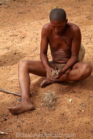 Africa;African;African-people;Bushman;Bushman-Living-Museum;Bushmanland;Bushmen;cultural;cultural-exchange;culture;demonstration;demonstrations;fire;fire-craft;fire-lighting;fire-lighting-with-sticks;Fire-making;fire-starting;fire-starting-with-sticks;fires;forager-society;Grashoek;Grashoek-Living-Museum;Grashoek-village;hunter_gatherer;Hunting-and-gathering;Ju-Hoansi_San-Living-Museum;JuHoansi;JuHoansi_San-men;JuHoansi_San-people;Living-Museum;Living-Museum-of-the-Ju-Hoansi_San;Living-Museum-of-the-JuHoansi_San;Living-Museums;making-fire;making-fires;Namibia;Namibia,-Africa;Otjozondjupa-District;Otjozondjupa-Region;people;person;rubbing-sticks-together;San;San-Living-Museum;San-people;Southern-Africa;tradition;traditional;Traditional-Bushman-Culture;traditional-clothing;traditional-costume;traditional-dress;traditional-fire-lighting;Traditional-San-Culture;tribe