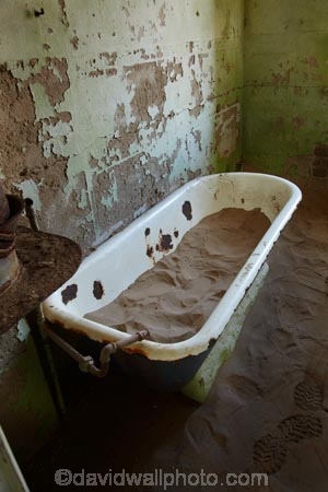 abandon;abandoned;abandoned-house;abandoned-houses;Africa;african;bath;bathroom;bathrooms;baths;bathtub;bathtubs;building;buildings;character;Colemans-hill;derelict;derelict-building;derelict-house;derelict-houses;dereliction;desert;deserted;deserts;desolate;desolation;destruction;empty;ghost-town;ghost-towns;heritage;historic;historic-building;historic-buildings;Historic-Ruins;historical;historical-building;historical-buildings;history;home;homes;house;houses;Kolmannskuppe;Kolmanskop;Kolmanskop-Ghost-town;Luderitz;namib;Namib-Desert;Namibia;neglect;neglected;old;old-fashioned;old_fashioned;ruin;ruins;run-down;rundown;rustic;sand;sandy;Southern-Africa;Southern-Namiba;southern-Namibia;tourism;tourist-attraction;tourist-attractions;tradition;traditional;tub;tubs;vintage