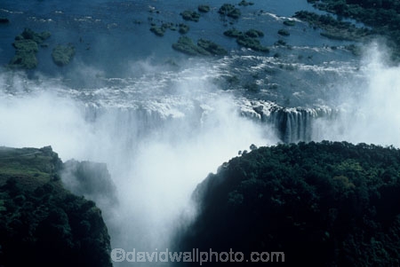 Victoria-Falls;Zimbabwe;Zambia;Southern-Africa;aerial;African;africa;waterfall;waterfalls;water;natural;wonder-of-the-world;seven-natural-wonders-of-the-world;mist;misty;spray;refraction;high;nature;power;aerials;vertical;;flow;chasm;zambezi;zambesi;bridge;bridges