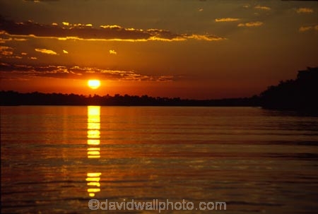 Zambezi-River;Zimbabwe;Zambia;Africa;African;Southern-Africa;sunset;sunsets;calm;calmness;peace;peaceful;peacefulness;tranquil;tranquility;reflection;reflections;orange;dark;low;river;rivers;wide;zambezi