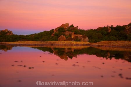 Africa;Big-Cave-Camp;boulder;boulders;Bulawayo;calm;dusk;evening;geological;geology;granite;kopje;kopjes;koppie;koppies;Matobo-Hills;Matobo-National-Park;Matopos-Hills;night;night_time;nightfall;pink;placid;pond;ponds;pool;pools;quiet;reflected;reflection;reflections;rock;rock-formation;rock-formations;rock-outcrop;rock-outcrops;rock-tor;rock-torr;rock-torrs;rock-tors;rocks;serene;smooth;Southern-Africa;still;stone;sunset;sunsets;tranquil;twilight;unusual-natural-feature;unusual-natural-features;water;Zimbabwe