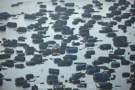 aerial;aerial-image;aerial-images;aerial-photo;aerial-photograph;aerial-photographs;aerial-photography;aerial-photos;aerial-view;aerial-views;aerials;Asia;Cambodia;Cambodian-floating-village;Cambodian-floodplain;Cambodian-village;Chong-Khneas;Chong-Khneas-Floating-Village;Chong-Khnies;Chong-Kneas;Chong-Kneas-Floating-Village;dirty-water;floating-home;floating-homes;floating-house;floating-houses;Floating-Village;Floating-Villages;freshwater-lake;freshwater-lakes;Indochina-Peninsula;Kampuchea;Kingdom-of-Cambodia;lake;lakes;Lower-Mekong-Basin;Mekong-Plain;muddy-water;Siem-Reap;Siem-Reap-Province;Southeast-Asia;Tonle-Sap;Tonle-Sap-Lake;TonlÃ©-Sap;TonlÃ©-Sap-Lake;UNESCO-Biosphere-Reserve;water