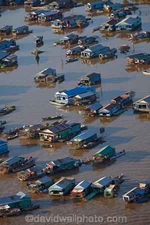 aerial;aerial-image;aerial-images;aerial-photo;aerial-photograph;aerial-photographs;aerial-photography;aerial-photos;aerial-view;aerial-views;aerials;Asia;Cambodia;Cambodian-floating-village;Cambodian-floodplain;Cambodian-village;Chong-Khneas;Chong-Khneas-Floating-Village;Chong-Khnies;Chong-Kneas;Chong-Kneas-Floating-Village;dirty-water;floating-home;floating-homes;floating-house;floating-houses;Floating-Village;Floating-Villages;freshwater-lake;freshwater-lakes;Indochina-Peninsula;Kampuchea;Kingdom-of-Cambodia;lake;lakes;Lower-Mekong-Basin;Mekong-Plain;muddy-water;Siem-Reap;Siem-Reap-Province;Southeast-Asia;Tonle-Sap;Tonle-Sap-Lake;TonlÃ©-Sap;TonlÃ©-Sap-Lake;UNESCO-Biosphere-Reserve;water