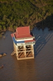 aerial;aerial-image;aerial-images;aerial-photo;aerial-photograph;aerial-photographs;aerial-photography;aerial-photos;aerial-view;aerial-views;aerials;Asia;Cambodia;Cambodian-floodplain;Chong-Khneas;Chong-Khneas-Floating-Village;Chong-Khnies;Chong-Kneas;Chong-Kneas-Floating-Village;dirty-water;faith;Floating-Village;Floating-Villages;freshwater-lake;freshwater-lakes;Indochina-Peninsula;Kampuchea;Kingdom-of-Cambodia;lake;lakes;Lower-Mekong-Basin;Mekong-Plain;muddy-water;place-of-worship;places-of-worship;religion;religions;religious;Siem-Reap;Siem-Reap-Province;Southeast-Asia;temple;temple-on-stilts;temples;Tonle-Sap;Tonle-Sap-Lake;TonlÃ©-Sap;TonlÃ©-Sap-Lake;UNESCO-Biosphere-Reserve;water