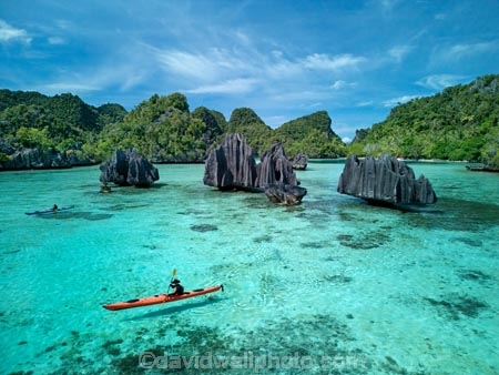 Namlol;Namlol-Lagoon;Namlol-Island;kayak;kayaking;kayaks;adventure;adventure-tourism;boat;boats;canoe;canoeing;canoes;coast;coastal;coastline;coastlines;coasts;ocean;oceans;sea;sea-kayak;sea-kayaking;sea-kayaks;kayaker;kayakers;paddle;paddler;paddlers;paddling;people;person;sea-kayaker;sea-kayakers;Reef;Coral-reef;coral;coral-reefs;corals;reef;reefs;aqua;aquamarine;blue;clean-water;clear-water;coast;cobalt-blue;cobalt-ultramarine;cobalt;ultramarine;teal-blue;tropical-island;tropical-islands;tropical-reef;tropical-reefs;turquoise;karst-landscape;limestone-karsts;karst;karsts;limestone;topography;landscape;landscapes;island;islands;karst-formations;karst-formation;Indonesia;aerial;aerial-photo;aerial-photograph;aerial-photographs;aerial-photography;aerial-photos;aerial-view;aerial-views;aerials;drone-aerial;drone;Misool;Raja-Ampat;West-Papua;Southwest-Papua;Misool-Is;Misool-Island;karst-landscape;landscape;landscapes;island;islands;outer-archipelago;archipelago;Misool-archipelago;paradise;tourism;travel