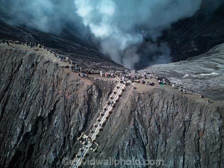Indonesia;aerial;aerial-photo;aerial-photograph;aerial-photographs;aerial-photography;aerial-photos;aerial-view;aerial-views;aerials;drone-aerial;drone;Java;Indonesian;Asia;South-East-Asia;Southeast-Asia;Mt-Bromo;Gunung-Bromo;Bromo;Mount-Bromo;steam;steaming;smoke;smoking;cinder-cone;scoria-cone;crater;craters;volcanic-crater;volcanic-craters;smoking-crater;stairs;stairway;stairways;tourist;tourists;tourism;people;adventure;adventure-tourism;active-volcano;active-volcanoes;volcanic;volcano;volcanoes;volcanic;mountain;mountainous;mountains;volcanic-cone;cone-volcano