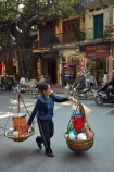 Asia;Asian;carrying-pole;carrying-stick;hanging-basket;hanging-baskets;Hanoi;hawker;hawkers;milkmaids-yoke;Old-Quarter;South-East-Asia;Southeast-Asia;street;street-scene;street-scenes;street-vendor;street-vendors;streets;vendor;vendors;Vietnam;Vietnamese;yoke;yokes