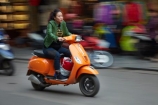 Asia;Asian;bike;bikes;blur;blurred;blurry;female;Hanoi;Hanoi-Old-Quarter;motion-blur;motorbike;motorbikes;motorcycle;motorcycles;motorscooter;motorscooters;Old-Quarter;orange;people;person;scooter;scooters;South-East-Asia;Southeast-Asia;speed-blur;step_through;step_throughs;street;street-scene;street-scenes;streets;vespa;vespas;Vietnam;Vietnamese;woman;women