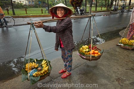Asia;Asian;Asian-conical-hat;Asian-conical-hats;bamboo-yoke;bamboo-yokes;carrying-pole;carrying-stick;Central-Sea-region;conical-hat;conical-hats;female;females;fruit;Hi-An;hanging-basket;hanging-baskets;Hoi-An;Hoi-An-Old-Town;Hoian;Indochina;ladies;lady;leaf-hat;leaf-hats;milkmaids-yoke;non-la;nón-lá;old-town;palm_leaf-conical-hat;people;person;produce;shoulder-pole;South-East-Asia;Southeast-Asia;street;street-scene;street-scenes;streets;UN-world-heritage-area;UN-world-heritage-site;UNESCO-World-Heritage-area;UNESCO-World-Heritage-Site;united-nations-world-heritage-area;united-nations-world-heritage-site;Vietnam;Vietnamese;Vietnamese-conical-hat;Vietnamese-conical-hats;Vietnamese-hat;Vietnamese-hats;Vietnamese-symbol;woman;women;world-heritage;world-heritage-area;world-heritage-areas;World-Heritage-Park;World-Heritage-site;World-Heritage-Sites;yoke;yokes