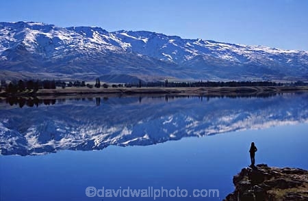 alone;calm;calmness;lakes;mountain;mountains;peaceful;peacefulness;people;person;ranges;reflecting;reflection;reflections;solo;still;stillness;tranquil;tranquility