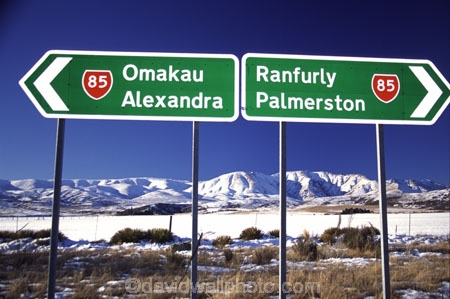 road-sign;roads;signs;mountain;-mountains;snow;cold;winter;direction;directions;rural;countryside;state-highway-85;transport;highways