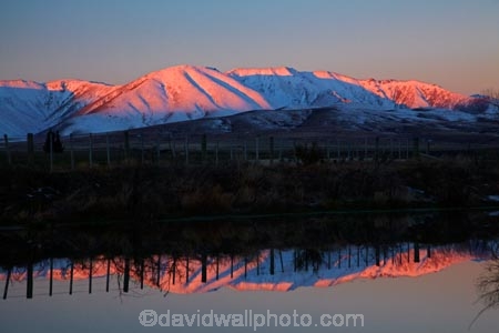 alpenglo;alpenglow;alpine;alpinglo;alpinglow;calm;Central-Otago;cold;Coldness;color;colors;colour;colours;dusk;evening;extreme-weather;fence;fence-line;fence-lines;fence_line;fence_lines;fenceline;fencelines;fences;freeze;freezing;Hawkdun-Ra;Hawkdun-Range;Hills-Creek;Ida-Ra;Ida-Range;Ida-Rd;Ida-Valley;Idaburn;irrigation-pond;Maniototo;mountain;mountainous;mountains;mt;N.Z.;New-Zealand;night;night_time;nightfall;NZ;Otago;Oturehua;placid;pond;ponds;quiet;reflected;reflection;reflections;S.I.;Scenic;Scenics;Season;Seasons;serene;SI;smooth;snow;snowy;South-Is;South-Island;Sth-Is;still;sunset;sunsets;tranquil;twilight;water;weather;white;winter;Wintertime;wintery;wintry