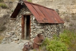building;buildings;Central-Otago;corrugated-iron;corrugated-roofing;corrugated-steel;gold-mines;gold-mining;goldfield-relics;Goldfields;Goldfields-Mining-Centre;goldfields-relics;Goldfields-tourist-attraction;heritage;historic;historic-building;historic-buildings;historic-place;historic-places;historic-site;historic-sites;historical;historical-building;historical-buildings;historical-place;historical-places;historical-site;historical-sites;history;house;houses;hut;huts;Kawarau-Gorge;miners-huts;N.Z.;New-Zealand;NZ;old;old-hut;Otago;Otago-Goldfields;S.I.;SI;South-Is;South-Island;stone-hut;stone-miners-hut;tradition;traditional