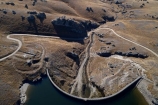 aerial;Aerial-drone;Aerial-drones;aerial-image;aerial-images;aerial-photo;aerial-photograph;aerial-photographs;aerial-photography;aerial-photos;aerial-view;aerial-views;aerials;arch;arch-dam;arch-dams;back-country;backcountry;Central-Otago;concrete-arch-dam;concrete-dam;country;countryside;dam;dams;Drone;Drones;farm;farming;farmland;farms;field;fields;geological;geology;gravel-road;gravel-roads;high-altitude;high-country;highcountry;highland;highlands;irrigation-dam;irrigation-lake;Maniototo;metal-road;metal-roads;metalled-road;metalled-roads;N.Z.;New-Zealand;NZ;Old-Dunstan-Road;Old-Dunstan-Track;Old-Dunstan-Trail;Otago;Poolburn;Poolburn-Dam;Poolburn-Lake;Poolburn-Reservoir;remote;remoteness;road;roads;rock;rock-formation;rock-formations;rock-outcrop;rock-outcrops;rock-tor;rock-torr;rock-torrs;rock-tors;rocks;Rough-Ridge;rural;S.I.;schist;schist-landscape;schist-rock;schist-rocks;SI;South-Is;South-Island;Sth-Is;stone;unpaved-road;unpaved-roads;unusual-natural-feature;unusual-natural-features;uplands