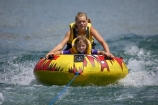 adventure;b1a5078;bannockburn;biscuiting;central;Central-Otago;child;children;dunstan;exciting;exhilaration;fast;fun;girl;girls;happy;hot;inflatable-tube;inner-tube;inner-tubing;inner_tubing;island;lake;Lake-Dunstan;lakes;leisure;N.Z.;new;new-zealand;NZ;otago;play;playing;recreation;S.I.;SI;south;South-Is;South-Is.;South-Island;speed;summer;Summertime;teenager;teenagers;thrill;Thrilling;tube;tubing;water;water-biscuit;water-sport;water-sports;watersport;watersports;wet;zealand