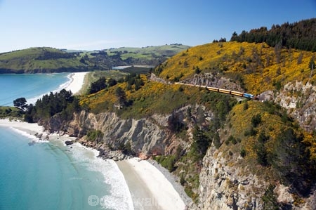 aerial;aerial-photo;aerial-photograph;aerial-photographs;aerial-photography;aerial-photos;aerial-view;aerial-views;aerials;beach;beaches;bluff;bluffs;carriage;carriages;cliff;cliffs;coast;coastal;coastline;coastlines;coasts;containers;Doctors-Point;Doctors-Point;Dunedin;gorse;N.Z.;New-Zealand;NZ;ocean;oceans;Otago;Pacific-Ocean;passenger-train;passenger-trains;rail;railroad;railroads;rails;railway;railways;S.I.;sand;sandy;sea;seas;Seasider-Train;shore;shoreline;shorelines;shores;SI;sightseeing-train;South-Is.;South-Island;steep;The-Seasider-Train;tourism;track;tracks;train;trains;transport;transportation;travel;Waitati;water