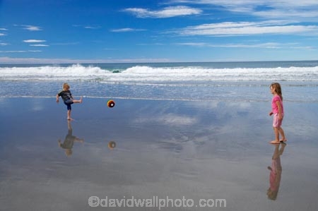 ball;balls;beach;beaches;boy;boys;brother;brothers;calm;child;children;coast;coastal;coastline;coastlines;coasts;Dunedin;football;game;games;girl;girls;kick;kicking;kicks;kid;kids;Kuri-Bush;little-boy;little-boys;little-girl;little-girls;N.Z.;New-Zealand;NZ;ocean;oceans;Otago;Pacific-Ocean;placid;play;playing;quiet;reflection;reflections;S.I;sand;sandy;sea;seas;serene;shore;shoreline;shorelines;shores;SI;sibling;siblings;sister;sisters;smooth;soccer;South-Is.;South-island;sport;sports;still;surf;tranquil;water;wave;waves
