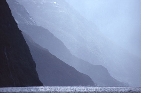 cloud;clouds;cloudy;fiordland-national-park;grey;hill;hills;mountain;mountains;rain-raining;shower;showers;storm;weather