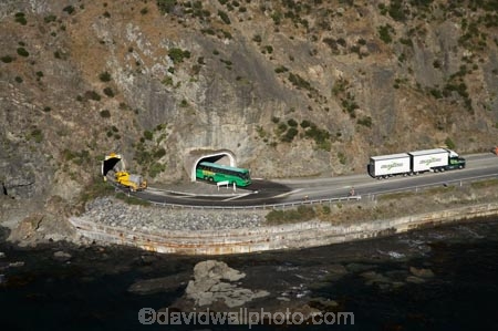 aerial;aerial-photo;aerial-photography;aerial-photos;aerial-view;aerial-views;aerials;articulated-truck;articulated-trucks;bluff;bluffs;cliff;cliffs;coast;coastal;coastline;coastlines;coasts;driving;highway;highways;Kaikoura;Kaikoura-Coast-Road;Kiwi-Experience;lorries;lorry;Marlborough;N.Z.;New-Zealand;NZ;ocean;open-road;open-roads;Parititahi-Tunnel;Parititahi-Tunnels;road;road-trip;road-tunnel;road-tunnels;roads;rugged;S.I.;sea;Seaward-Kaikoura-Range;Seaward-Kaikoura-Ranges;shore;shoreline;shorelines;shores;SI;South-Island;State-Highway-1;State-Highway-one;steep;transport;transportation;travel;traveling;travelling;trip;truck;trucks;tunnel;tunnels;water