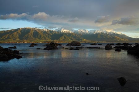 break-of-day;calm;coast;coastal;coastline;coastlines;coasts;dawn;dawning;daybreak;first-light;Kaikoura;Kaikoura-Coast;Kaikoura-Range;Kaikoura-Ranges;Marlborough;morning;New-Zealand;NZ;ocean;oceans;Pacific-Ocean;placid;quiet;reflected;reflection;reflections;S.I.;sea;seas;Seaward-Kaikoura-Range;Seaward-Kaikoura-Ranges;serene;shore;shoreline;shorelines;shores;smooth;snow;snow-capped;snowy;South-Is;South-Island;Sth-Is;still;sunrise;sunrises;sunup;tranquil;water