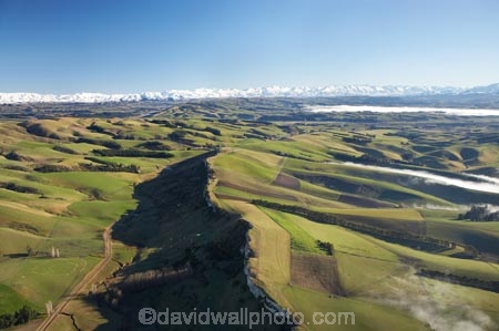 aerial;aerial-photo;aerial-photograph;aerial-photographs;aerial-photography;aerial-photos;aerial-view;aerial-views;aerials;agricultural;agriculture;Canterbury;cave;cloud;clouds;cloudy;country;countryside;farm;farming;farmland;farms;field;fields;fog;foggy;fogs;Limestone-Valley;meadow;meadows;mist;mists;misty;N.Z.;New-Zealand;NZ;paddock;paddocks;pasture;pastures;range;ranges;ridge;ridgeline;ridgelines;rural;S.I.;season;seasonal;seasons;SI;snow;snow-capped;snow_capped;snowcapped;snowy;South-Canterbury;South-Is;South-Island;southern-alps;winter