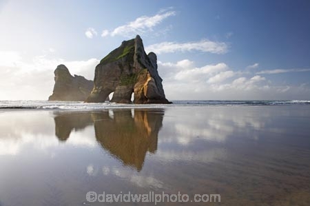 archway;Archway-Is;Archway-Is.;Archway-Island;Archway-Islands;archways;beach;beaches;calm;coast;coastal;coastline;foreshore;geological;geology;N.Z.;Nelson-Region;New-Zealand;North-West-Nelson-Region;NZ;placid;quiet;reflection;reflections;rock;rock-archway;rock-archways;rock-formation;rock-formations;rock-outcrop;rock-outcrops;rock-tor;rock-torr;rock-torrs;rock-tors;rocks;S.I.;sand;sandy;serene;shore;shoreline;SI;smooth;South-Is.;South-Island;still;stone;Tasman-Sea;tranquil;water;Wharariki-Beach