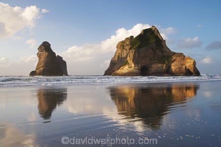 Archway-Is;Archway-Is.;Archway-Island;Archway-Islands;beach;beaches;calm;coast;coastal;coastline;foreshore;geological;geology;N.Z.;Nelson-Region;New-Zealand;North-West-Nelson-Region;NZ;placid;quiet;reflection;reflections;rock;rock-formation;rock-formations;rock-outcrop;rock-outcrops;rock-tor;rock-torr;rock-torrs;rock-tors;rocks;S.I.;sand;sandy;serene;shore;shoreline;SI;smooth;South-Is.;South-Island;still;stone;Tasman-Sea;tranquil;water;Wharariki-Beach
