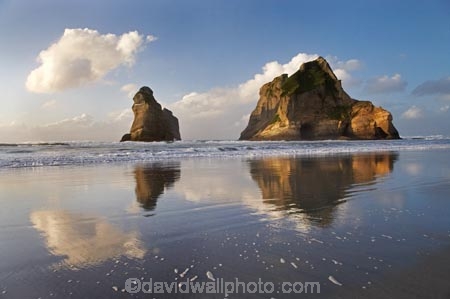 Archway-Is;Archway-Is.;Archway-Island;Archway-Islands;beach;beaches;calm;coast;coastal;coastline;foreshore;geological;geology;N.Z.;Nelson-Region;New-Zealand;North-West-Nelson-Region;NZ;placid;quiet;reflection;reflections;rock;rock-formation;rock-formations;rock-outcrop;rock-outcrops;rock-tor;rock-torr;rock-torrs;rock-tors;rocks;S.I.;sand;sandy;serene;shore;shoreline;SI;smooth;South-Is.;South-Island;still;stone;Tasman-Sea;tranquil;water;Wharariki-Beach