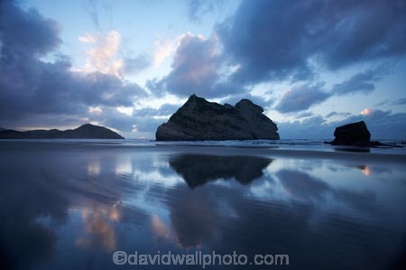 Archway-Is;Archway-Is.;Archway-Island;Archway-Islands;beach;beaches;black-cloud;black-clouds;calm;cloud;cloudy;coast;coastal;coastline;dark-cloud;dark-clouds;dusk;evening;foreshore;geological;geology;grey-cloud;grey-clouds;N.Z.;Nelson-Region;New-Zealand;nightfall;North-West-Nelson-Region;NZ;Pilch-Point;placid;quiet;rain-cloud;rain-clouds;reflection;reflections;rock;rock-formation;rock-formations;rock-outcrop;rock-outcrops;rock-tor;rock-torr;rock-torrs;rock-tors;rocks;S.I.;sand;sandy;serene;shore;shoreline;SI;sky;smooth;South-Is.;South-Island;still;stone;storm;storm-clouds;storms;stormy;Tasman-Sea;tranquil;twilight;water;Wharariki-Beach
