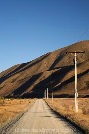 agriculture;Ahuriri-Valley;Birchwood-Road;country;countryside;drought;dry;dusty;farm;farming;farmland;farms;field;fields;gravel-road;gravel-roads;line;lines;meadow;meadows;metal-road;metal-roads;metalled-road;metalled-roads;New-Zealand;North-Otago;Otago;paddock;paddocks;pasture;pastures;pole;poles;post;posts;power-line;power-lines;power-pole;power-poles;road;roads;rural;South-Island;straight;straights;summer;telegraph-line;telegraph-lines;telegraph-pole;telegraph-poles;Waitaki-District;wire;wires