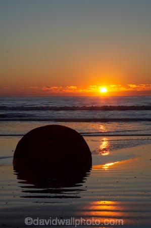 beach;beaches;boulder;break-of-day;calm;coast;coastal;coastline;coastlines;coasts;concretion;dawn;dawning;daybreak;first-light;formation;geological;geology;marble;marbles;Moeraki;Moeraki-Boulder;Moeraki-Boulders;morning;N.Z.;New-Zealand;North-Otago;NZ;ocean;orange;Otago;placid;quiet;reflection;reflections;rock;rocks;round;S.I.;sand;sea;sedementary;serene;shore;shoreline;shorelines;shores;SI;smooth;South-Island;sphere;still;sunrise;sunrises;sunup;tranquil;twilight;Waikati-District;Waitaki-District;water