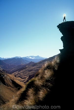 adventure;bluff;bluffs;cliff;cliffs;danger;dangerous;edge;excitement;exciting;height;high;landscape;outdoor;outdoors;outside;sheer;silhouette;silhouettes;sun;terrain;wilderness