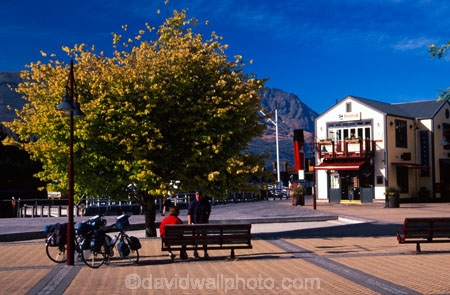 tourism;resort-town;queenstown;south-island;new-zealand;holiday;holidays;vacation;vacations;yellow;leaves;colours;colour;color;colors;golden;park;parks;reserve;reserves;tree;trees;autumn;steamer-wharf;mall;malls;shop;shops;shopping;travel;pave;paving;pavement;cyclist;cyclists;bicycle;bicycles;cycle;cycles;seat;park-bench;bench;seats;benches