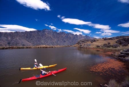 kayak;kayaks;kayaker;kayakers;water;paddle;paddler;paddlers;paddling;paradise;beautiful;lakes;lake;adventure;adventure-tourism;recreation;outdoors;outdoor;outside;relax;relaxing;yellow;boat;pristine;summer;holiday;holidays;vacation;vacations;deer-park-heights;deer-park;the-remarkables;remarkables;queenstown;south-island;new-zealand;tarn;tarns;pond;ponds;sea-kayak;sea-kayaks;red;two;pair;mountain;mountains