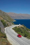 automobile;automobiles;bend;bends;car;cars;centre-line;centre-lines;centre_line;centre_lines;centreline;centrelines;corner;corners;Devilsl-Staircase-Road;Devils-Staircase;driving;highway;highways;lake;Lake-Wakatipu;lakes;N.Z.;New-Zealand;NZ;open-road;open-roads;Otago;Queenstown;red-car;red-cars;road;road-trip;roads;S.I.;SI;South-Island;tranportation;transport;transportation;travel;traveling;travelling;trip;trips;vehicle;vehicles
