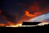 barn;barns;cloud;clouds;dusk;evening;farm-shed;farm-sheds;hay-shed;hay-sheds;Mossburn;N.Z.;New-Zealand;nightfall;NZ;orange;S.I.;SI;sky;South-Is;South-Island;Southland;Sth-Is;sunset;sunsets;twilight