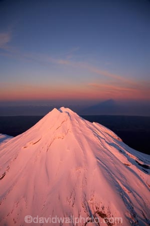 aerial;aerial-photo;aerial-photograph;aerial-photographs;aerial-photography;aerial-photos;aerial-view;aerial-views;aerials;alp;alpenglo;alpenglow;alpine;alpinglo;alpinglow;alps;altitude;apricot;break-of-day;cold;color;colors;colour;colours;dawn;dawning;daybreak;Egmont-N.P.;Egmont-National-Park;Egmont-NP;first-light;freeze;freezing;high-altitude;morning;mount;Mount-Egmont;Mount-Taranaki;Mount-Taranaki-Egmont;mountain;mountain-peak;mountainous;mountains;mountainside;mt;Mt-Egmont;Mt-Taranaki;Mt-Taranaki-Egmont;mt.;Mt.-Egmont;Mt.-Taranaki;Mt.-Taranaki-Egmont;N.I.;N.Z.;New-Zealand;NI;North-Is;North-Is.;North-Island;NZ;orange;peak;peaks;pink;season;seasonal;seasons;shadow;shadows;snow;snow-capped;snow_capped;snowcapped;snowy;summit;summits;sunrise;sunrises;sunup;Taranaki;volcanic;volcano;volcanoes;white;winter;wintery