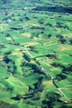 spring,-grass,-green,-fence,-fe;hedgerow;hedgerows;sheep;lamb;lambs;farm;farms;farming;farmland;paddock;paddocks;field;fields;pasture;pastures;meadow;meadows;agriculture;rural;dairy;cow;cows;plain;plains;verdant;lush;taranaki;new-zealand;aerials;aerial