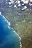 aerial;aerials;agriculture;cloud;clouds;coast;coastal;coastline;dairy;farm;farmland;farms;field;fields;grass;green;hedgerow;hedgerows;high-altitude;land;lush;meadow;meadows;new-zealand;north-is.;north-island;ocean;paddock;paddocks;pasture;pastures;plain;plains;run-off;run_off;rural;sea;shore;shoreline;South-Taranaki;tasman-sea;verdant;water