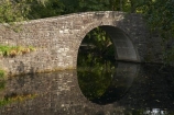 bridge;bridges;calm;gardens;Hamilton;Hamilton-Gardens;masonry;N.I.;N.Z.;New-Zealand;NI;North-Island;NZ;placid;quiet;reflection;reflections;serene;smooth;still;stone-bridge;stone-work;tranquil;Waikato;water