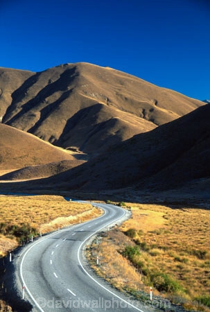 hill;hills;mountain;mountains;road;roads;curve;curved;curving;wind;windy;winding;rural;isolation;isolated;empty;quiet