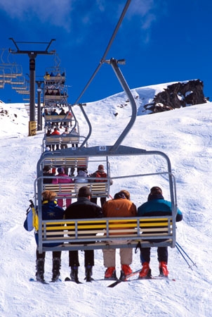 chair-lift;children;daughter;family;father;fours;holiday;lift;mother;queue;sitting;ski;skier;skiers;skiing;skis;son;transport;transportation