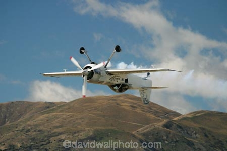 warbirds-over-wanaka;warbird;warbirds;wanaka;south-island;new-zealand;nz;airshow;airshows;air-show;air-shows;demonstration;display;displays;air-display;air-displays;flight;flights;fly;flying;flyer;flyers;aviator;aviators;aviation;aviating;pilot;pilots;plane;planes;aeroplane;aeroplanes;airplane;airplanes;aircraft;air-craft;Sukhoi-SU_31;stunt;Lithuanian;Jurgis-Kairys;sukhois;sukhoi;smoke-trail;smoke-trails;vapour-trail;vapour-trails;upside-down;up-side-down;upsidedown;aerobatic;aerobatics;stunts