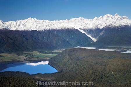 aerial;aerial-photo;aerial-photograph;aerial-photographs;aerial-photography;aerial-photos;aerial-view;aerial-views;aerials;alp;alpine;alps;altitude;Aoraki-Mt-Cook;beautiful;beauty;beech-gap;bush;bush-line;bush-lines;bush_line;bush_lines;bushline;bushlines;calm;cold;endemic;forest;forests;Franz-Josef-Glacier;glacial;glacier;glaciers;green;high-altitude;lake;Lake-Mapourika;lakes;main-divide;mount;Mount-Cook;Mount-Tasman;mountain;mountain-peak;mountainous;mountains;mountainside;mt;Mt-Cook;Mt-Tasman;mt.;Mt.-Cook;Mt.-Tasman;N.Z.;native;native-bush;natives;natural;nature;New-Zealand;NZ;peak;peaks;placid;quiet;rain-forest;rain-forests;rain_forest;rain_forests;rainforest;rainforests;range;ranges;reflection;reflections;S.I.;scene;scenic;serene;SI;smooth;snow;snow-capped;snow-line;snow-lines;snow_capped;snow_line;snow_lines;snowcapped;snowline;snowlines;snowy;South-Is.;South-Island;South-West-New-Zealand-World-Heritage-Area;Southern-Alps;still;summit;summits;Te-Poutini-National-Park;Te-Wahipounamu;timber;tranquil;tree;tree-line;tree-lines;tree-trunk;tree-trunks;tree_line;tree_lines;treeline;treelines;trees;trunk;trunks;water;West-Coast;Westland;westland-national-park;winter;wood;woods;World-Heritage-Area